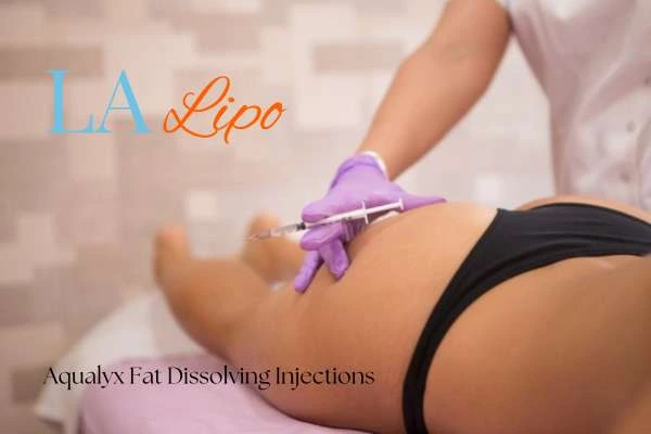 Woman having fat dissolving injections Upper Edmonton on thighs